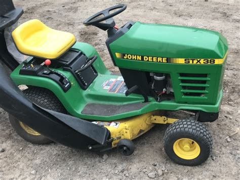 John Deere Stx38 Lawn Tractor Le Lawn Mowers Snow Blowers And More K Bid