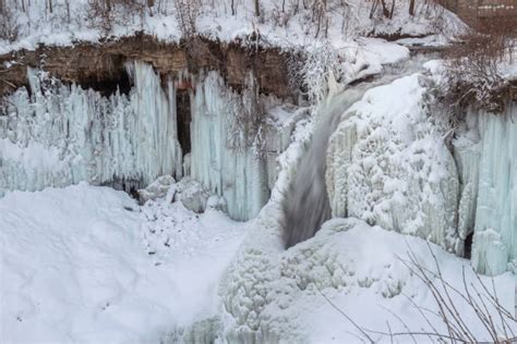 Frozen Minnehaha Falls Stock Photos Pictures And Royalty Free Images