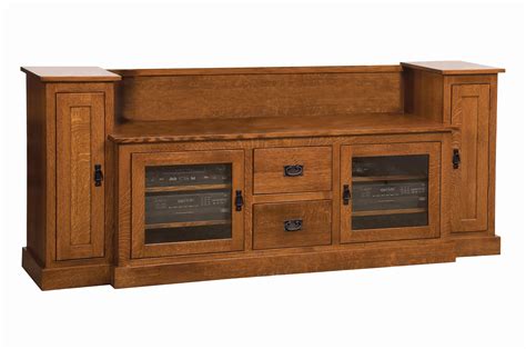 This amish made fireplace and tv stand with handcrafted out of solid red oak and comes standard with component storage under the tv and cabinet storage for media. Amish Mission TV Stand with Towers
