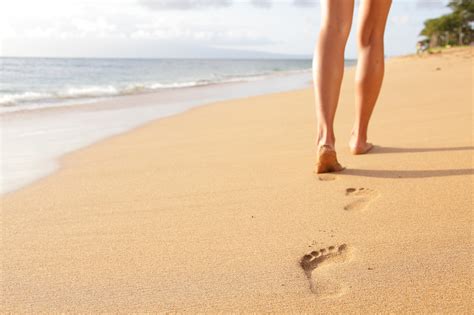 Beach Travel Woman Walking On Sand Beach Closeup Reading Simplified