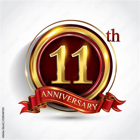 11th Anniversary Logo With Ring And Ribbon Golden Colored Isolated On