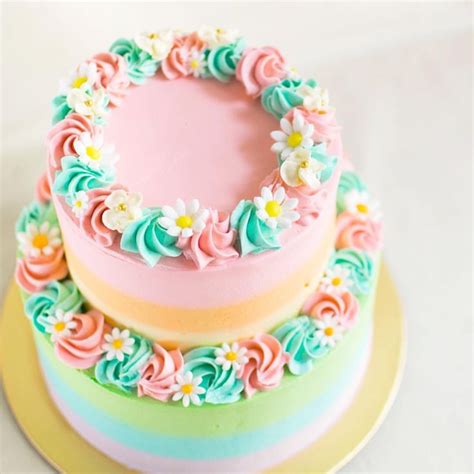 Pastel Rainbow Two Tier Cake With Fondant Daisies Chocolate Hazelnut