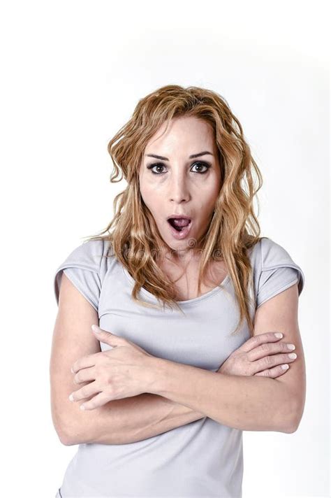 Portrait Of Attractive Woman Surprised And Excited In Shock And