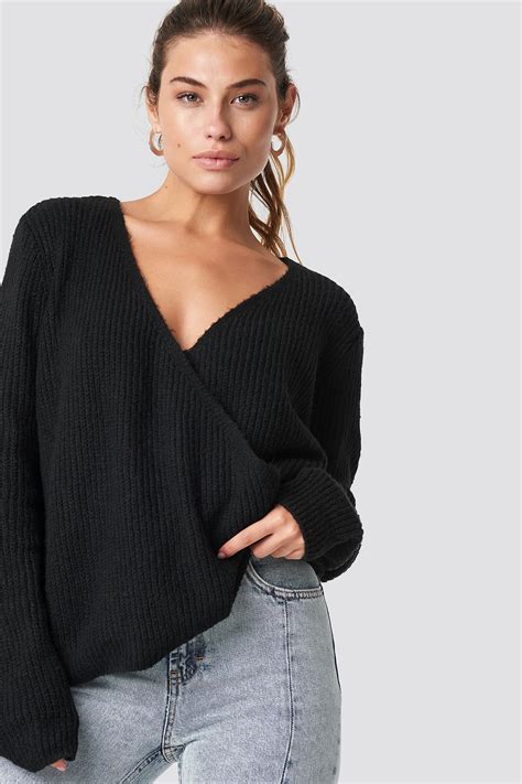 The Crossed Knitted Sweater By Trendyol Features A Plunging V Neckline
