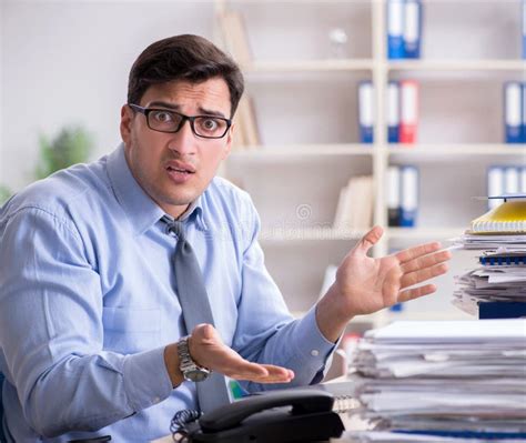 Extremely Busy Businessman Working In Office Stock Photo Image Of