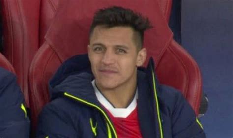 arsenal news alexis sanchez caught laughing on bench during humiliating bayern defeat