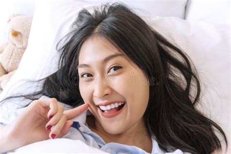 Happiness Smiling Woman Using Smartphone For Selfie On The Bed For Social Media Cheerful Girl