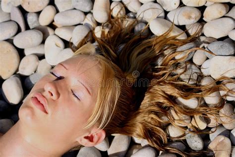 Beautiful Womans Head On A Peble Beach Stock Photo Image Of Head Nose