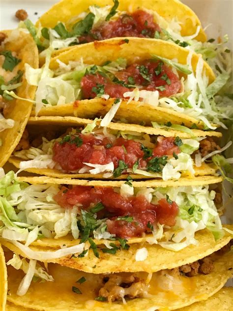 Add 2 1/2 pounds boneless, skinless chicken breasts, turn to coat in the salsa, then arrange in an even layer. Baked Ground Chicken Tacos - Together as Family
