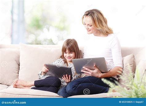 Mother And Daughter At Living Room Stock Image Image Of Beautiful Laptop 65310825