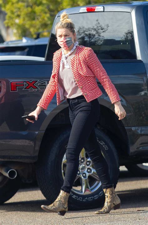 She had a strict catholic upbringing. Amber Heard in a Red Blazer Was Seen Out in San Diego 01 ...