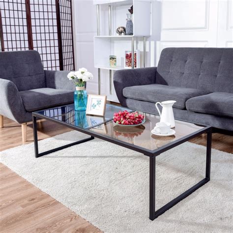 It is crafted with a black stained wood and brushed metal frame and toped off with a. Giantex Rectangular Coffee Table Tempered Glass Top Metal ...
