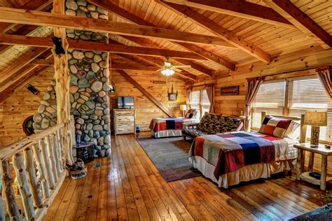 King size bedroom with full bath, tv and french doors open to deck where hot. Dancing Bear Lodge - 4 bed / 2-1/2 bath log cabin ...