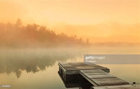 Cottage Foggy Sunrise High Res Stock Photo Getty Images