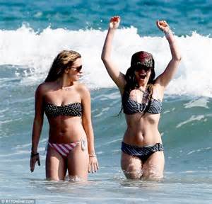 Avril Lavigne Cracks A Rare Smile In The Malibu Surf Daily Mail Online
