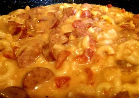 Add garlic, onion and sausage, and cook, stirring frequently, until sausage is lightly browned and onions are soft, about 3 minutes. One Pot Cheesy Smoked Sausage & Pasta Skillet Recipe by ...