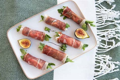 Prosciutto Wrapped Figs With Goats Cheese And Arugula Picnic Lifestyle