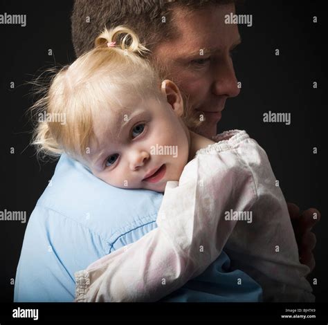 Daughter Hugging Father Stock Photo Alamy