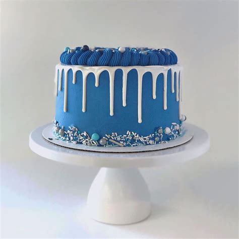 Winter Wonderland Blue Birthday Cake With Silver White And Blue