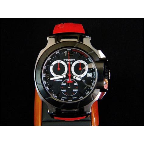 Free shipping in the usa. Tissot T- Race men's watch with red arm band.