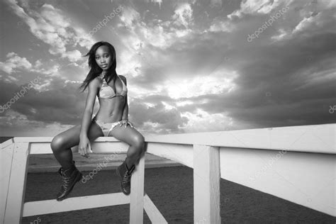 Woman Sitting On The Ledge Stock Photo Felixtm