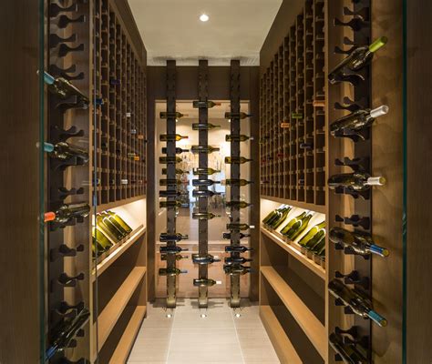 Wine Room Featuring Millwork And Liquid System Wine Rack System Wall