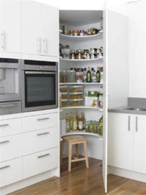 Many of these corner storage ideas can be accomplished with a few tools and hanging brackets. Corner pantry curved shelves | Kitchen corner cupboard ...