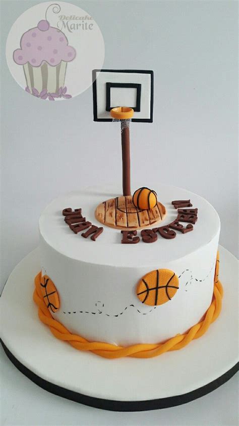 A Birthday Cake With Basketballs On Top And A Basket In The Middle Is Ready To Be Eaten