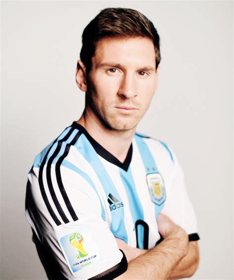lionel messi of argentina poses during the official fifa world cup 2014 portrait session on june