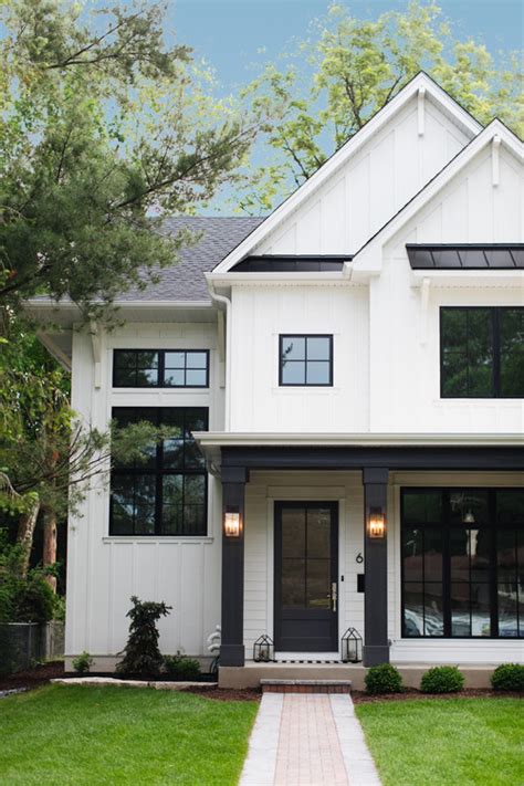Modern farmhouse plans are highly popular in today's market. Modern White Farmhouse Exterior Ideas - Pickled Barrel