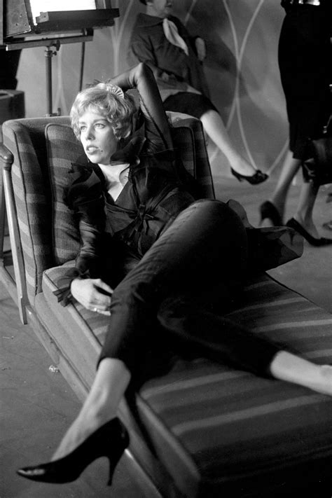 Black And White Photograph Of Woman Sitting On Couch