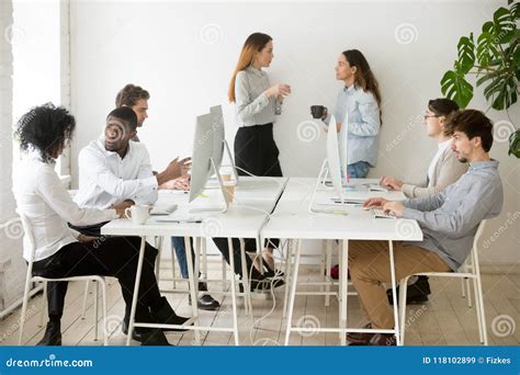 People Working Doing Different Things In Coworking Office Stock Image