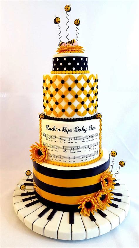 When i was making a lot of cookies, i think i made well over two thousand baby shower themed cookies in my time. Bumble Bee & Musical Themed Baby Shower Cake - cake by ...