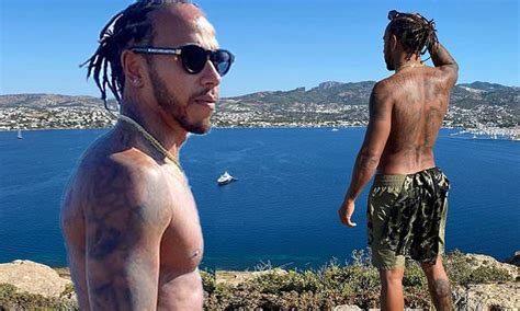 Lewis Hamilton Displays His Ripped Physique As He Reaches The Summit On A Hike