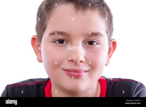 Head And Shoulders Close Up Portrait Of Young Boy Wearing Black And Red