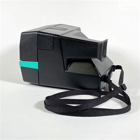 Polaroid Sun 600 With Upcycled Retro Green And Pink Face Refreshed