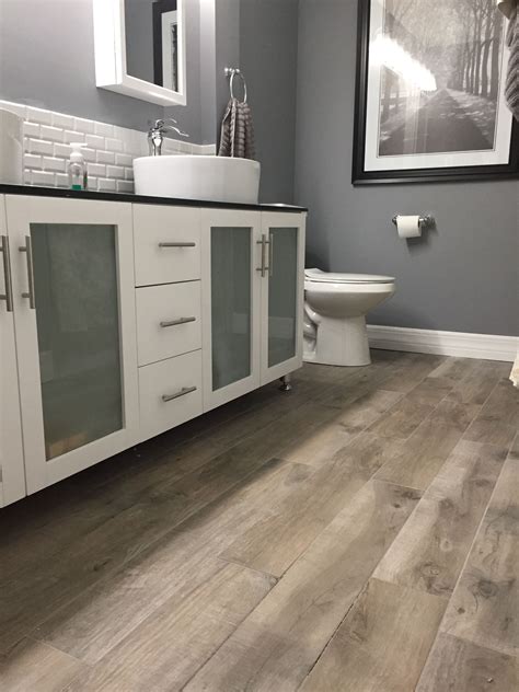 Trafficmaster ceramica 12 customer image in x 24 in coastal. Tile floor looks like rustic wood planks. Home Depot ...