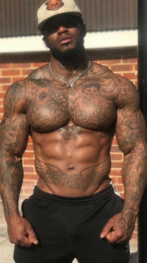 Pin By Anthony On Black Wtatts Muscle Men Tribal Tattoos Black Power