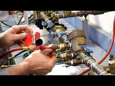 If a check valve is installed, even if the trap outlet piping is connected to a common collection line, the condensate discharged from equipment in operation will not backflow into equipment that is out of service. Double Check Valve Assembly - YouTube