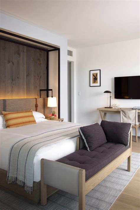 While you might not consider a fireplace in the bedroom to be a bastion of simplicity, plenty of negative space a neutral color palette mean the room is peaceful in its own way. Hotel Victor (Miami, FL in 2020 | Hotel bedroom design ...