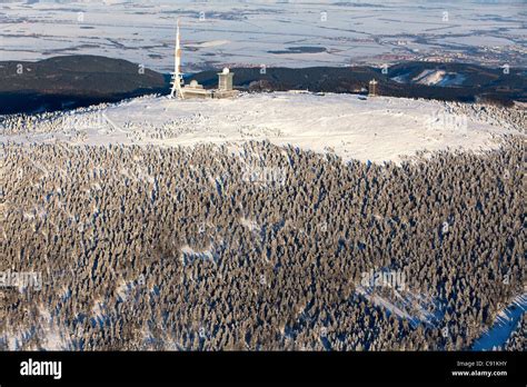 Aerial View Above The Snow Covered Brocken Mountain In Harz National