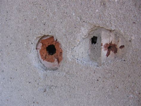 Holes In The Concrete Brick Wall Bullet Holes Stock Photo Image Of
