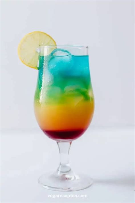 Rainbow Paradise Cocktail With Blue Curacao Vega Recepten Recipe In 2021 Cocktails With