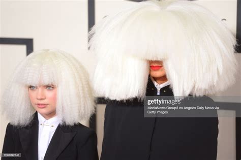 Maddie Ziegler And Singersongwriter Sia Attends The 57th Annual