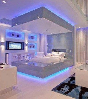 Camere da letto per ragazze americane elproyectodepaulyd. una moderna e rilassante camera da letto illuminata da strisce led azzurre | Futuristic bedroom ...