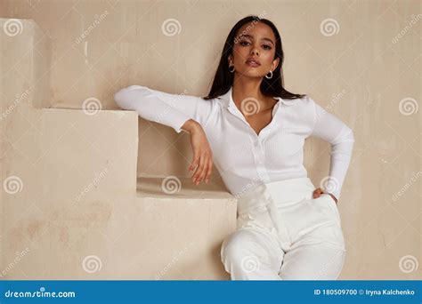Beautiful Sexy Brunette Woman Tanned Skin Face Cosmetic Makeup Wear White Suit Pants For Date