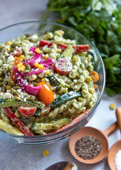 This summery pasta salad combines our favorite cucumber salad with fresh dill and pasta for the perfect potluck side dish! Summer Pasta Salad - Kevin Is Cooking