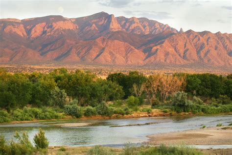 Rio Grande River With Sandia Mountains In Backgroundnear Albuquerque