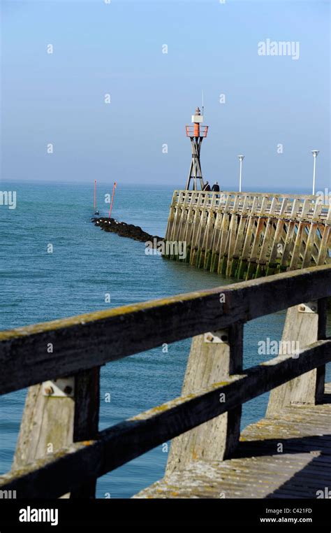Jetty At Courseulles Sur Mercalvadosnormandy France Stock Photo Alamy