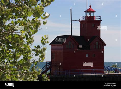 The Historic Holland Harbor Light Also Known As The Big Red Lighthouse Stands On Lake Michigan